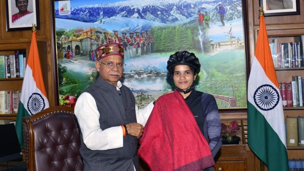 Governor Shukla felicitates cyclist Asha Malviya Governor Shukla felicitates cyclist Asha Malviya HIMACHAL HEADLINES