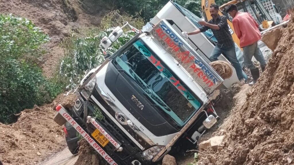 Truck hit by heavy landslide near Sanaura Truck hit by heavy landslide near Sanaura HIMACHAL HEADLINES