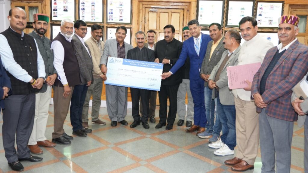 Agnihotri handed a cheque of Rs 2 crore to CM Sukhu on behalf of Himachal Pradesh State Cooperative Bank HIMACHAL HEADLINES